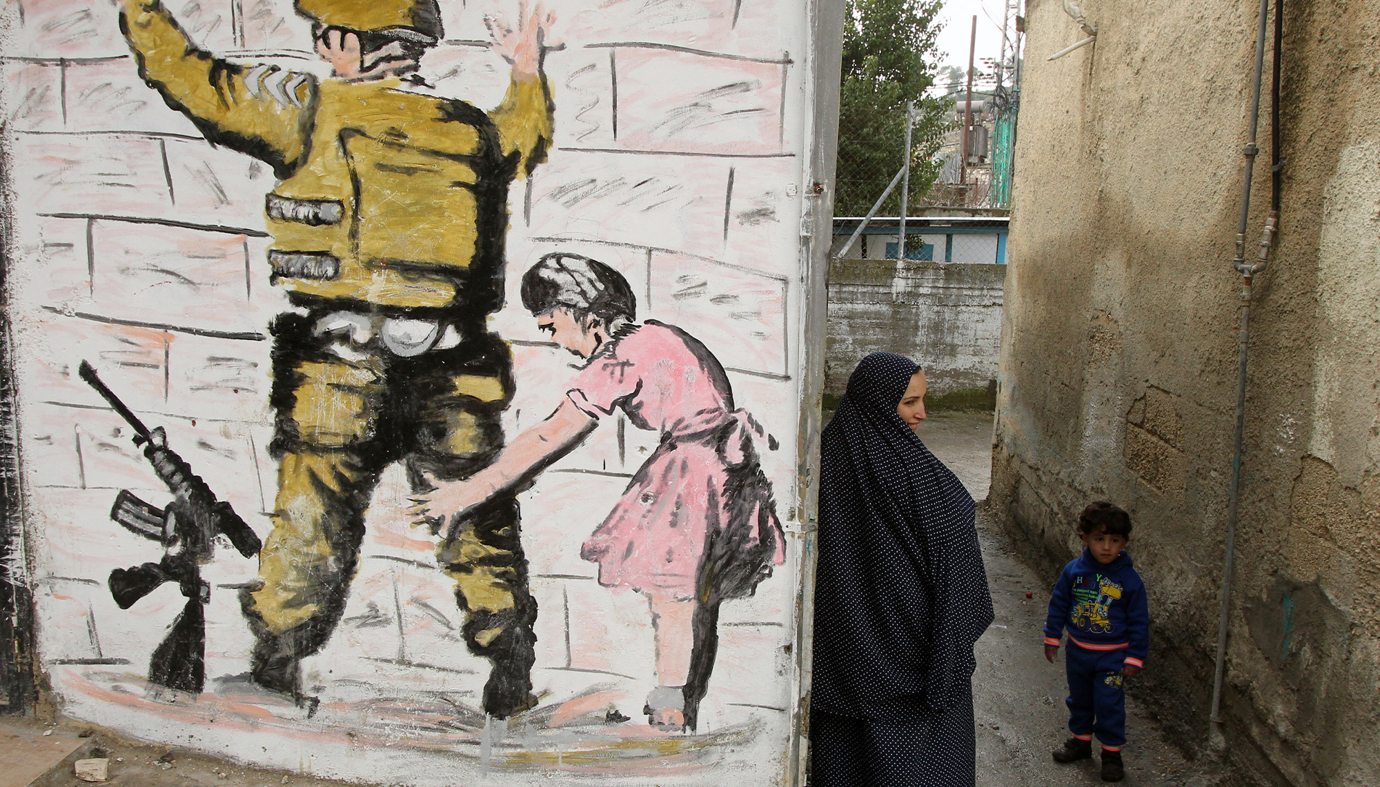صورة الفلسطيني المذعن في أعمال بانكسي